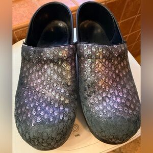 Dansko clogs in peacock color